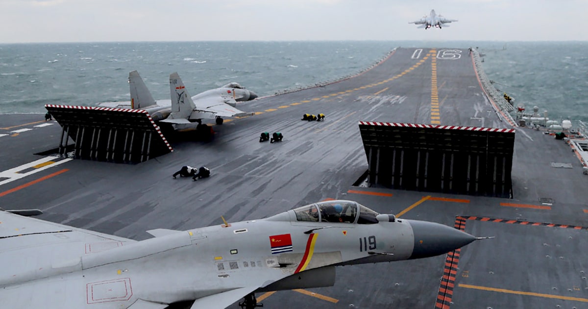 Taiwan says Chinese military sent a record 153 planes toward island during war games