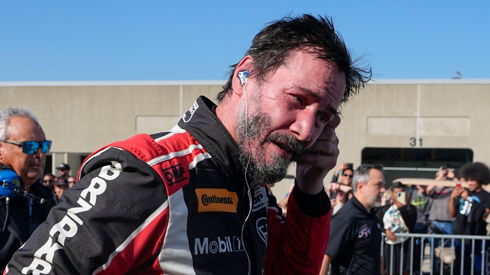 Keanu Reeves, who starred in Speed and The Matrix, spins off the track on professional racing debut in Indianapolis | US News