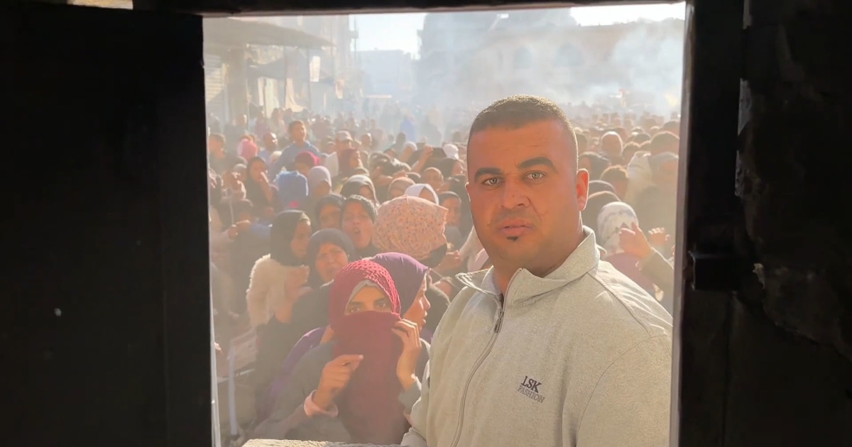 Large crowds wait for bread outside Gaza bakery as flour shortage worsens