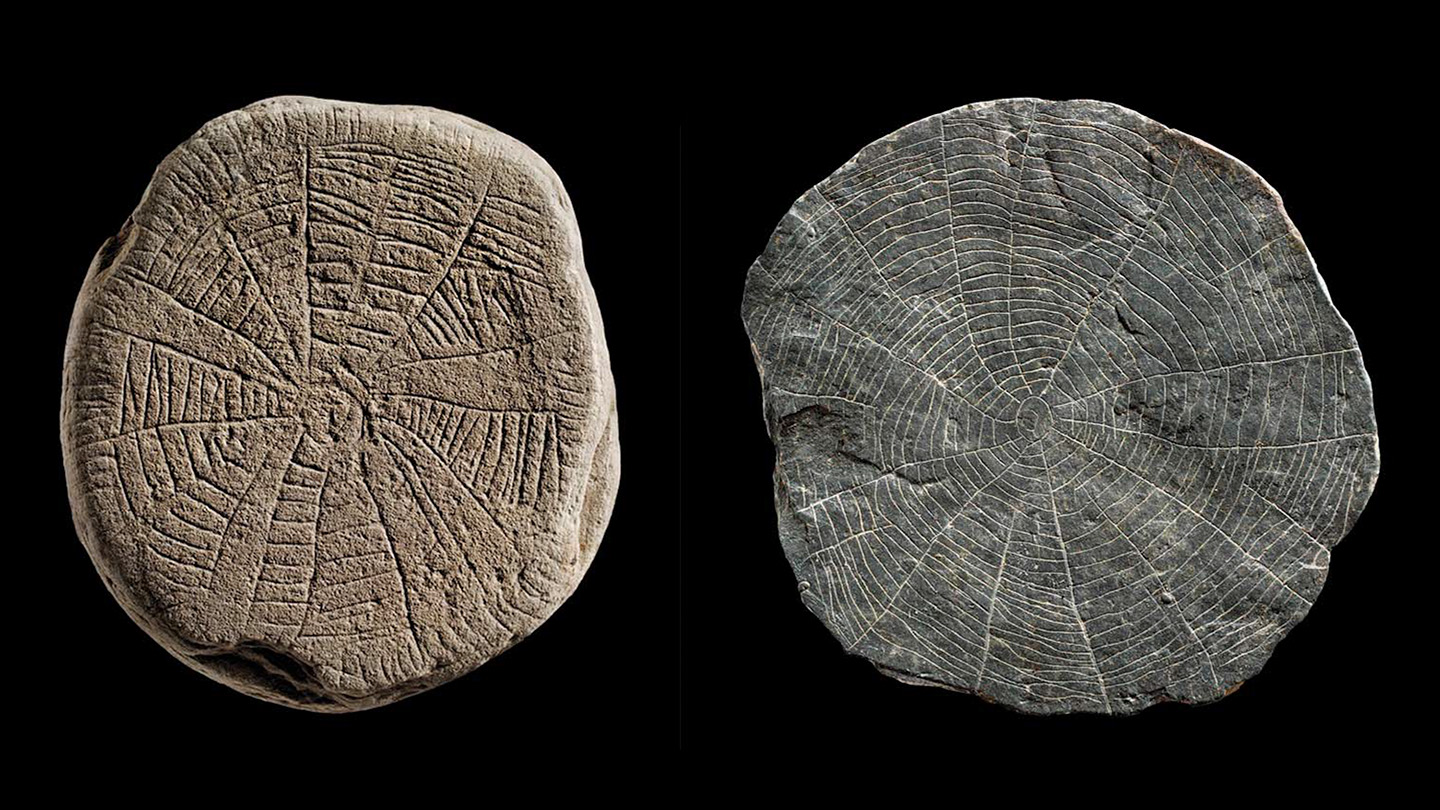 Ancient, engraved stones may have been buried to summon the sun