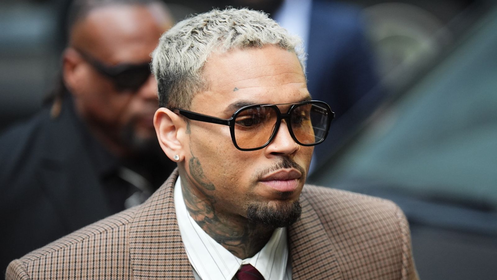 Chris Brown: R&B singer denies further charges following alleged bottle attack in London club | Ents & Arts News